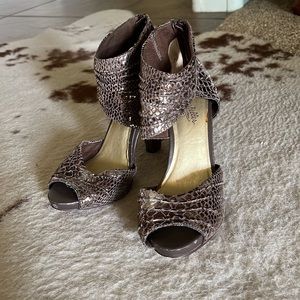 Open toe heels w/ankle strap, leather mock croc bronze metallic in color 4” heel